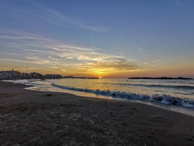 beach in Italy's Romagna Riviera at sunset. High quality photo