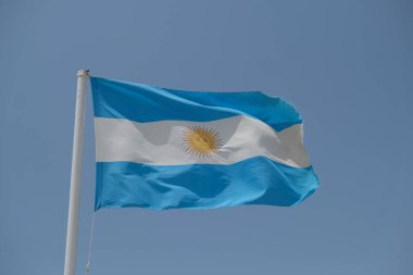 Argentina flag waving in the wind on sunny day. High quality photo