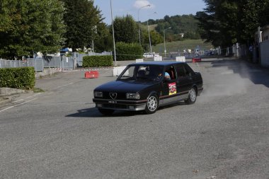 Bibbiano-Reggio Emilia Italy - 07 15 2015 : Free rally of vintage cars in the town square Alfa Romeo Alfetta 90 quadrifoglio verde. High quality photo