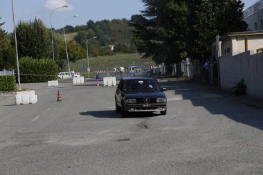 Bibbiano-Reggio Emilia Italy - 07 15 2015 : Free rally of vintage cars in the town square Alfa Romeo Alfetta 90 quadrifoglio verde. High quality photo