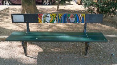 Turin, Italy - 2022 06 04: piazza Moncenisio Mau bench decorated with style of famous artists. High quality photo