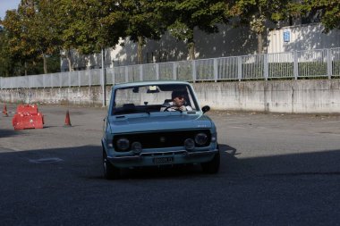 Bibbiano-Reggio Emilia Italy - 07 15 2015 : Free rally of vintage cars in the town square Fiat 128 Rally. High quality photo