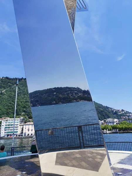 metal statue of Como lake in sunny day. High quality photo
