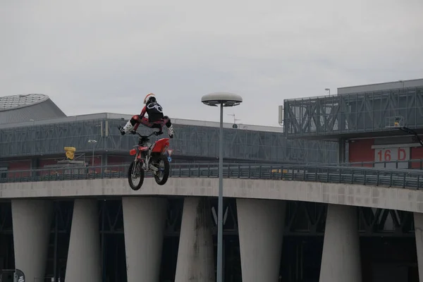 stock image Milano, Italy - 2021 11 27: Eicma Milano Bike Expo Riot Riders Free Style Motocross Figures in air. High quality photo