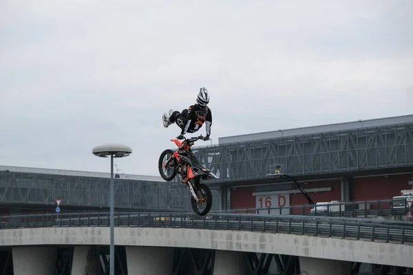 stock image Milano, Italy - 2021 11 27: Eicma Milano Bike Expo Riot Riders Free Style Motocross Figures in air. High quality photo