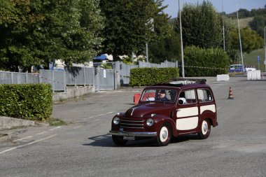 Bibbiano-Reggio Emilia Italy - 07 15 2015 : Free rally of vintage cars in the town square Fiat Topolino. High quality photo