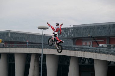 Milano, Italy - 2023 11 23: Eicma Milano Bike Expo freestyle motocross jumps and figures. High quality photo clipart