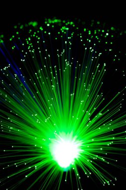 background made of lights and optical fibers green. High quality photo clipart