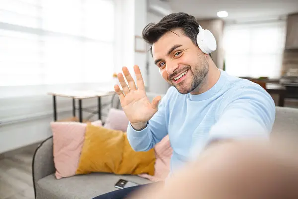 Brown Haired Man White Headphones His Head Sits Couch Living — Stock Photo, Image