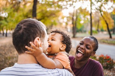 Joyful Laughter: Family Fun in the Fall. clipart