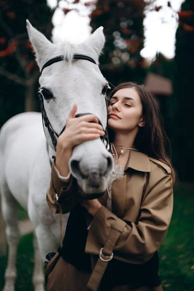 Young Woman Hugs White Horse High Quality Photo — Stock Photo, Image