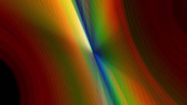 Dinamik renkler siyah arkaplana karşı akar ve karışır, enerji yaratır.