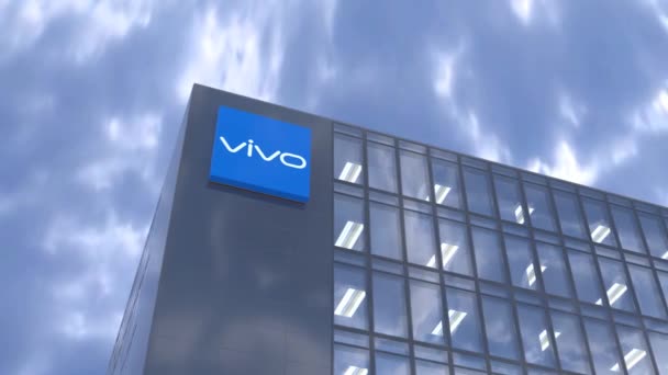 ブルースカイのVivoコミュニケーションテクノロジー 活気に満ちた企業本社ロゴ — ストック動画