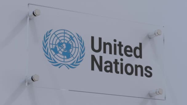 Logo Della Bandiera Delle Nazioni Unite Sul Piatto Parete Vetro — Video Stock
