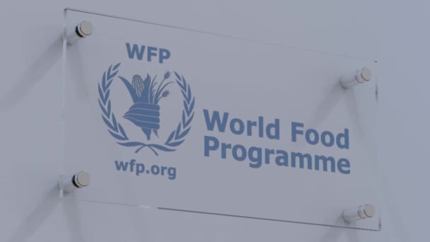 Programa Mundial Alimentos Logotipo Bandeira Distorcida Pam Superfície Vidro Texturizado — Vídeo de Stock