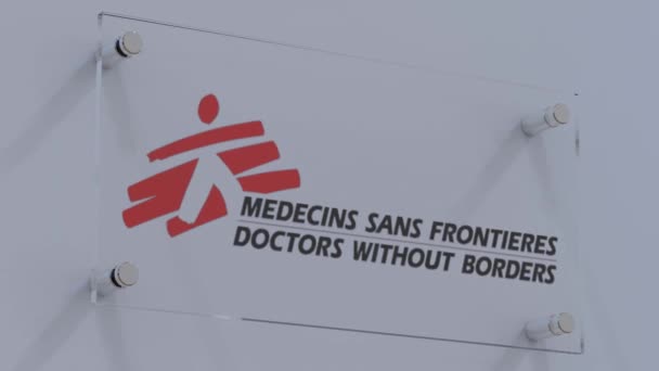Ärzte Ohne Grenzen Fahnen Logo Teller Mit Metallischen Akzenten Der — Stockvideo
