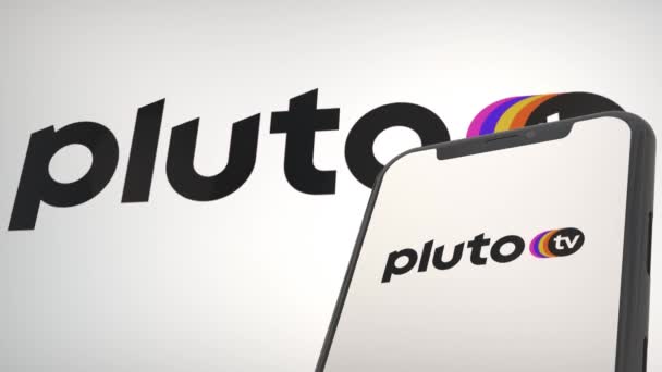 Pluto App Logo Sullo Schermo Del Display Mobile Sullo Sfondo — Video Stock