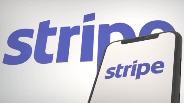 Logo Application Stripe Dans Écran Affichage Mobile Éditorial Arrière Plan — Video