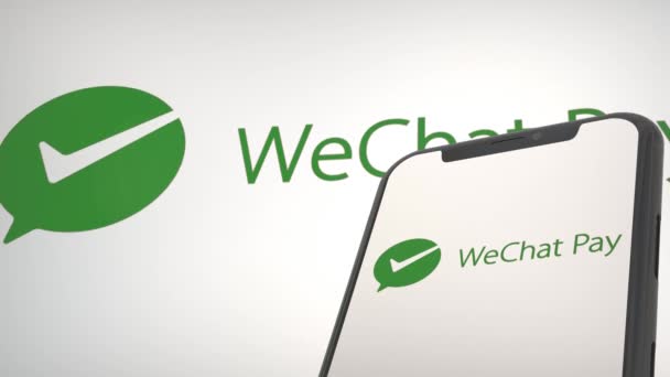 Logo Aplikasi Wechat Pay Dalam Layar Seluler Dan Editorial Latar — Stok Video