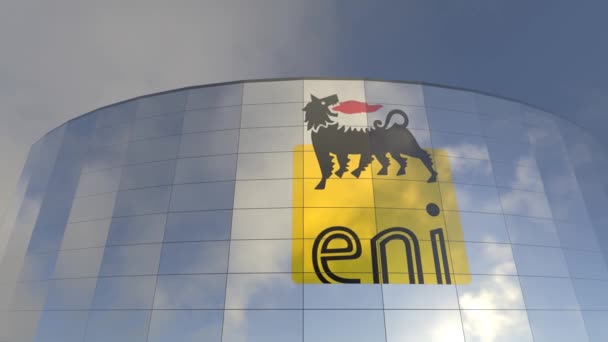 Eniのロゴ 企業の反射 資本主義のアイコニックなガラス塔 企業の世界の壮大さと力を反映したガラス塔 — ストック動画