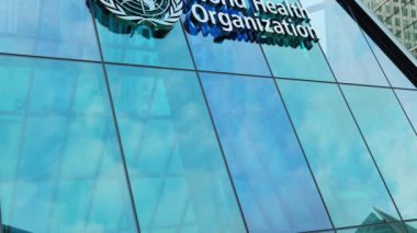 Dünya Sağlık Örgütü WHO modern şehir kulesi şehir merkezindeki ofis şirketleri borsa editörlüğü yapıyor