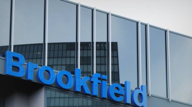 Brookfield Corporation Stock data presented on the logo of the office facade editorial clipart