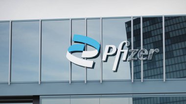 Ofis maskesinin logosu üzerine Pfizer Stock verileri sunuldu