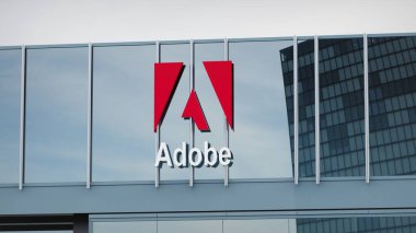 Adobe Stock data presented on the logo of the office facade editorial clipart