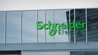 Schneider Electric Stock verileri ofis ön sayfasının logosu üzerine sunuldu