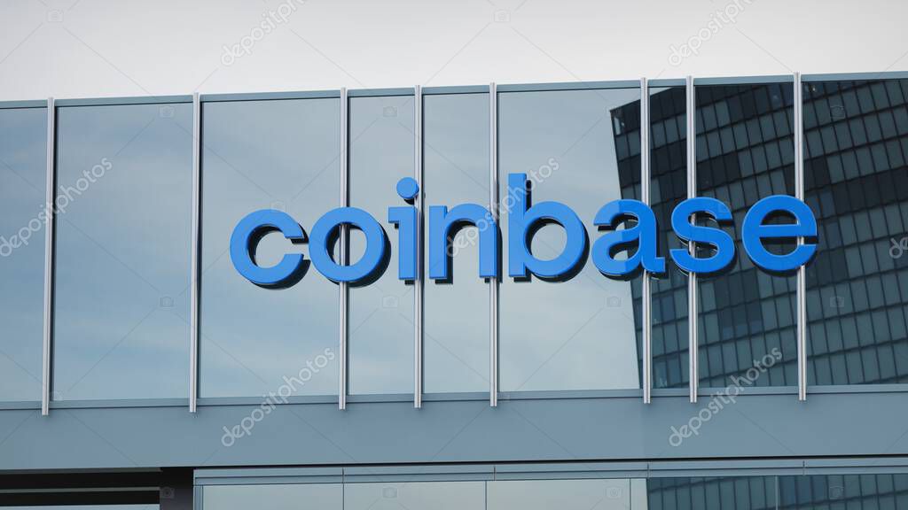 Coinbase Stock data presented on the logo of the office facade editorial
