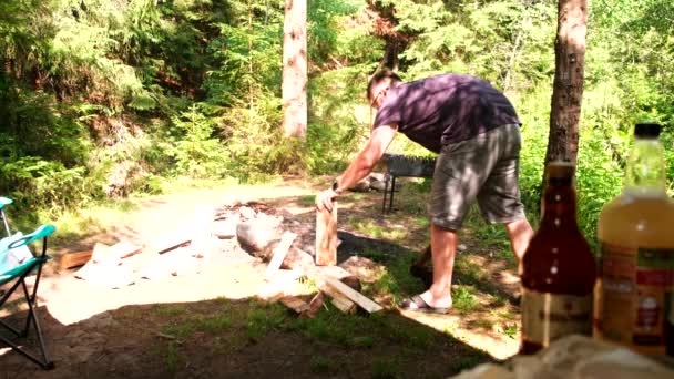 Camping Man Chops Log Summertime — Wideo stockowe