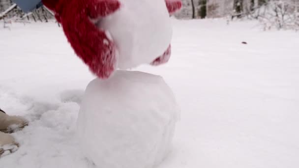 Woman Making Snowman Close Rolling Snowball — Stock Video