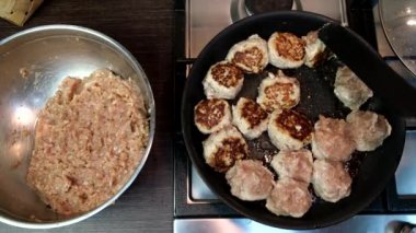 overhead view of frying meatballs on pan domestic food pov