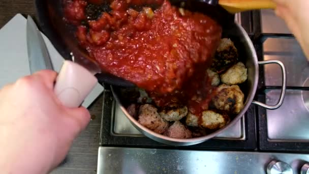 Cooking Meatballs Tomatoes Sauce Overhead View Domestic Kitchen — Stock video