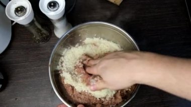 cooking meatballs forcemeat overhead add hot rise domestic kitchen
