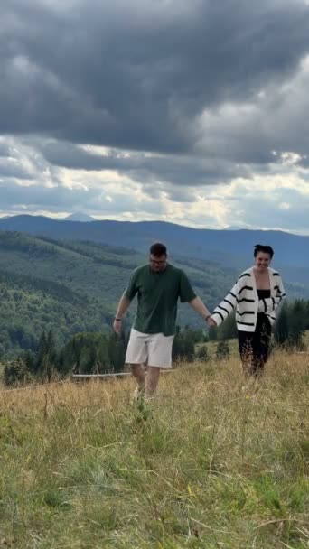 Happy Hikers Couple Enjoying Mountains View Holding Hands — Stock Video