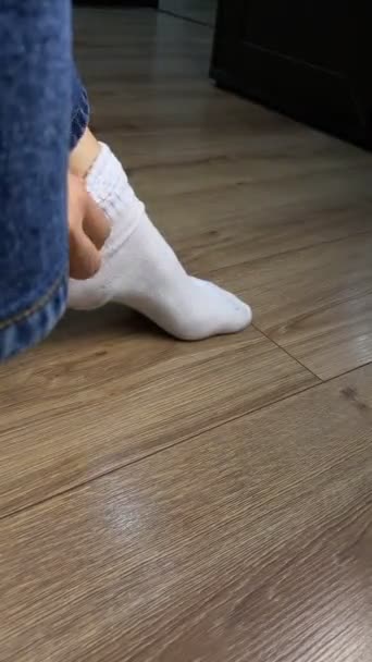 Woman Put Sock Feet Close — Stock Video