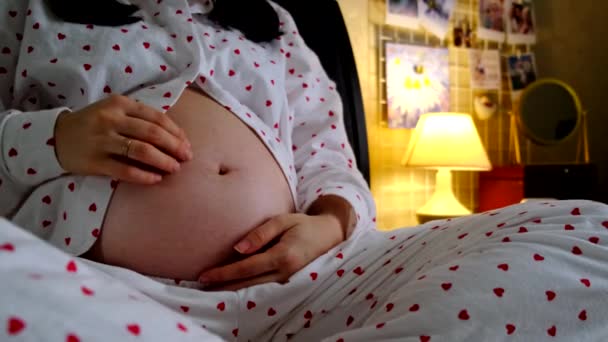Happy Future Mother Sitting Bed Playing Pregnant Belly Copy Space — Stock Video