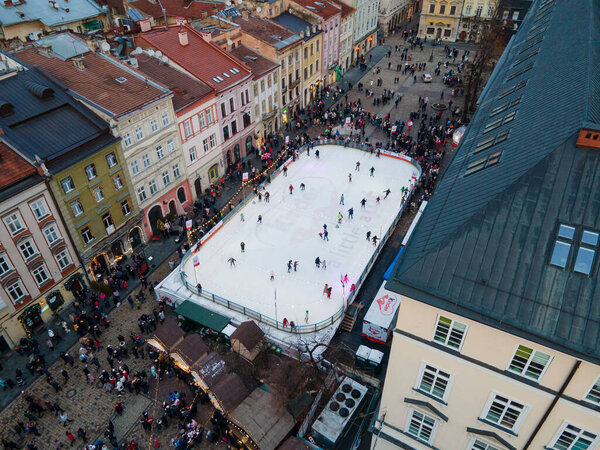 crowded people at city center christmas fair Lviv city Ukraine overhead
