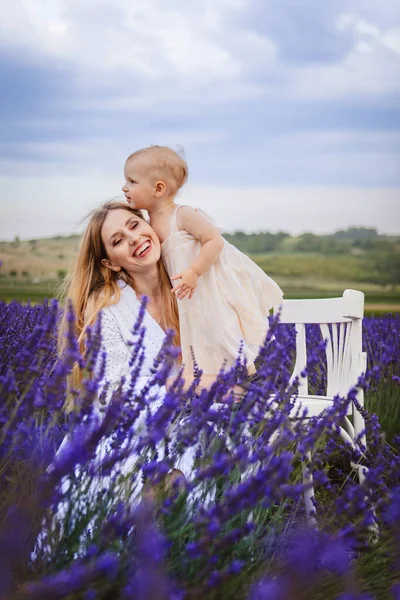 Happy Moment Mother Hugs Her Daughter While Sitting Lavender Field — Stock Photo, Image