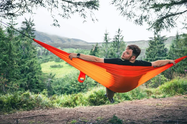 Man Hammock Camping Site Mountains Background Copy Space — Stock Photo, Image