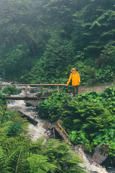 Man Yellow Raincoat Mountain Trail Overcast Weather — Stock Photo, Image
