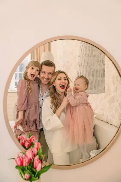 Happy Family Four Mirror Reflection Mother Father Two Daughters — Stock Photo, Image