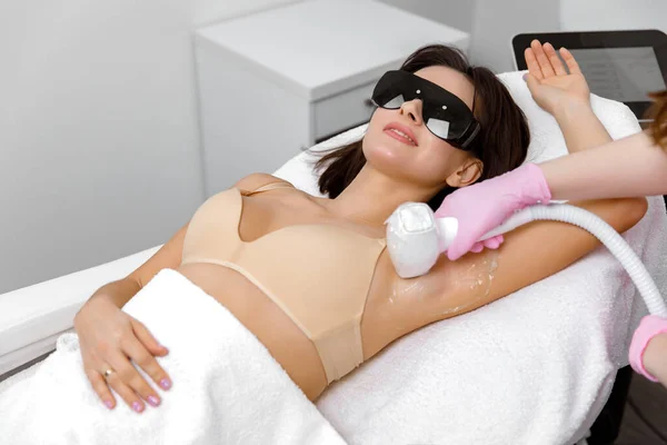 laser rejuvenation, Hair removal, Cosmetic Clinic,Applying gel,Hair removal cream,Removal of underarm hair by laser treatment,Hair-free skin