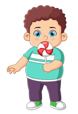 Büyük bir çizim lolipopu yiyen sevimli bir çocuk.