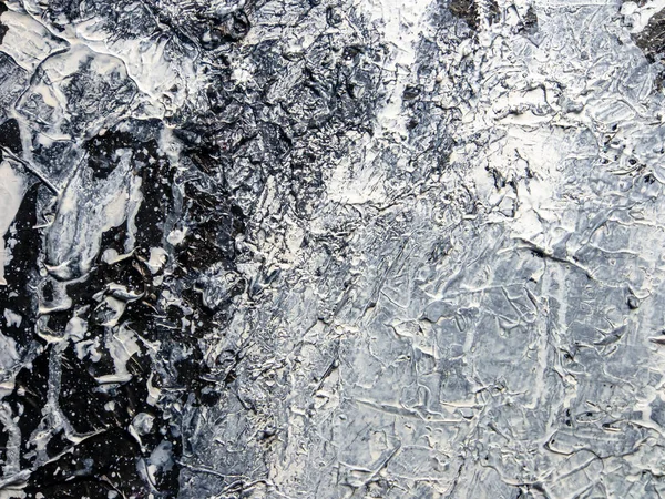 Black and white surface of the painting. Texture of the painting. Acrylic colors painting.