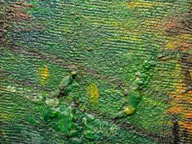 Resmin renkli yüzeyi. Resmin dokusu. Resim fraktürü boyama. Renkli doku. Soyut arkaplan. Yeşil, sarı, siyah renklerle yağlı boya..