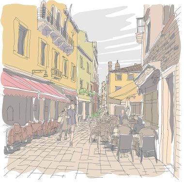 Venice, İtalya 'da bir sokak. İnsanlar sokakta yürüyorlar. İnsanlar masalarda oturuyor..