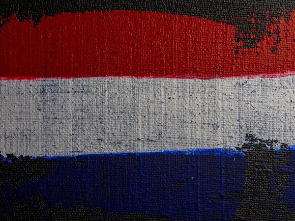 Hollanda 'nın fırça boyalı bayrağı. Hollanda 'nın el yapımı bayrağı.