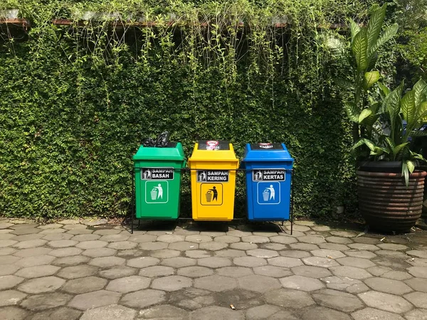Three types of trash cans in public places. Trash cans with various colors. Outdoor garbage sorting trash can
